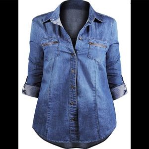 Denim shirt with faux zip pockets.
